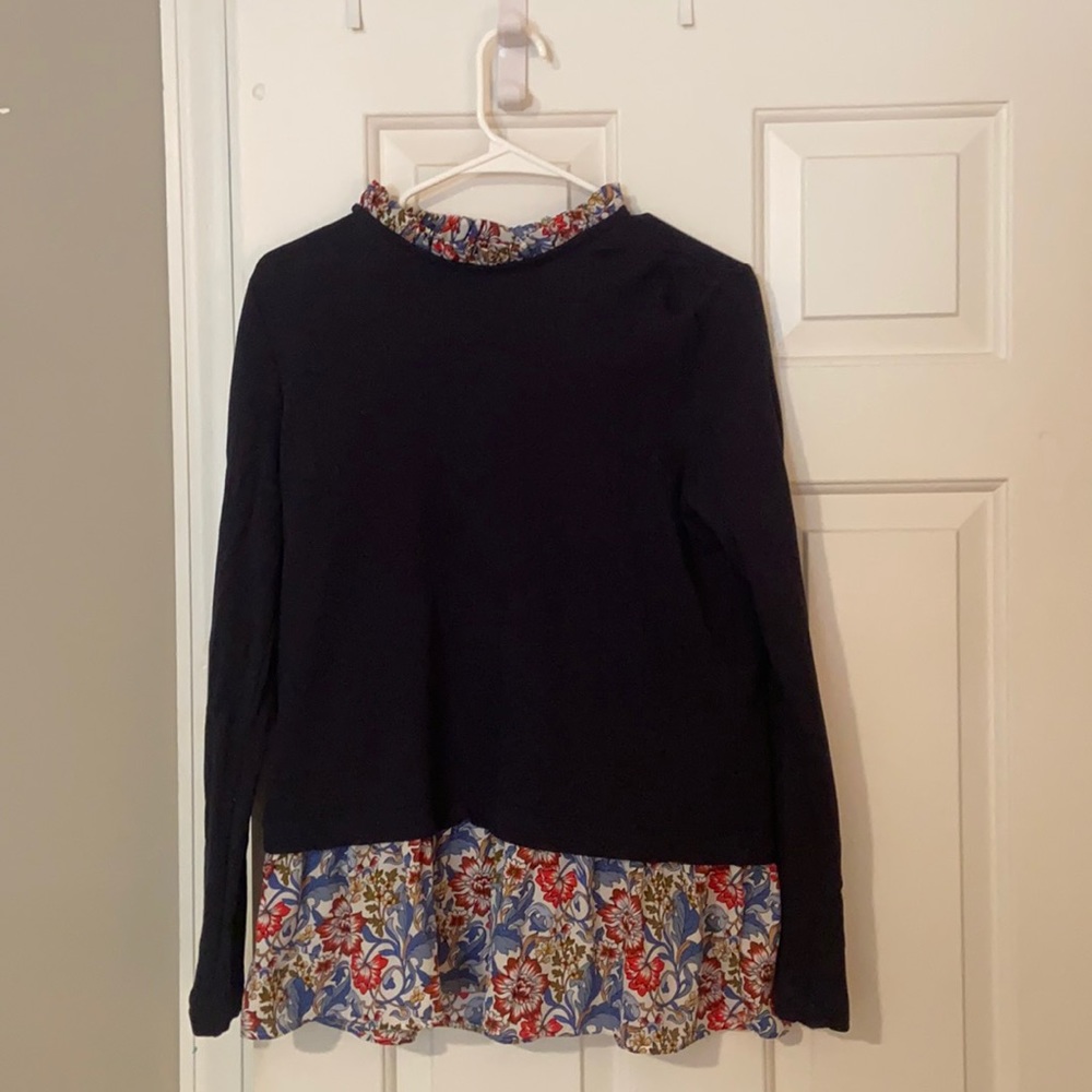 Layered knit top with keyhole back.